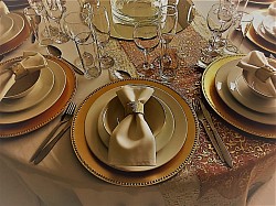 Gold Baseplates, Patterned gold runner with dusty pink underlay, White continental Crockery, white napkins, gold napkin ring, cutlery, glassware, round glass bowl, round mirror