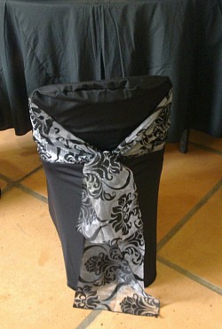 Black stretch chair cover, black & white patterned tieback