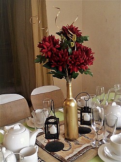 Gold Centerpiece Bottle, black hanging candleholders