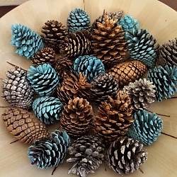 Gold, silver, blue decorative pine cones